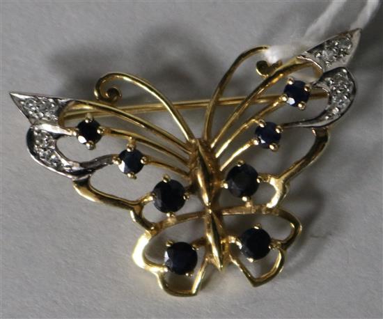 A modern 9ct gold, sapphire and diamond set butterfly brooch, 35mm.